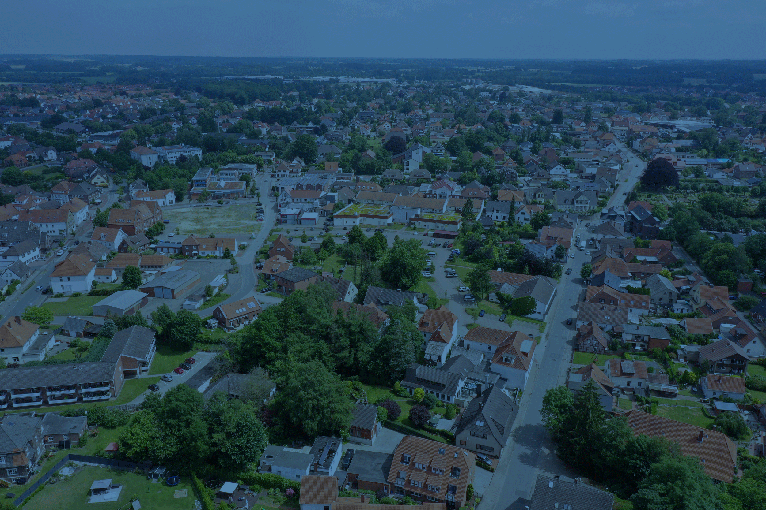 Luftbild von Bassum mit Wohnbebauung und Umland